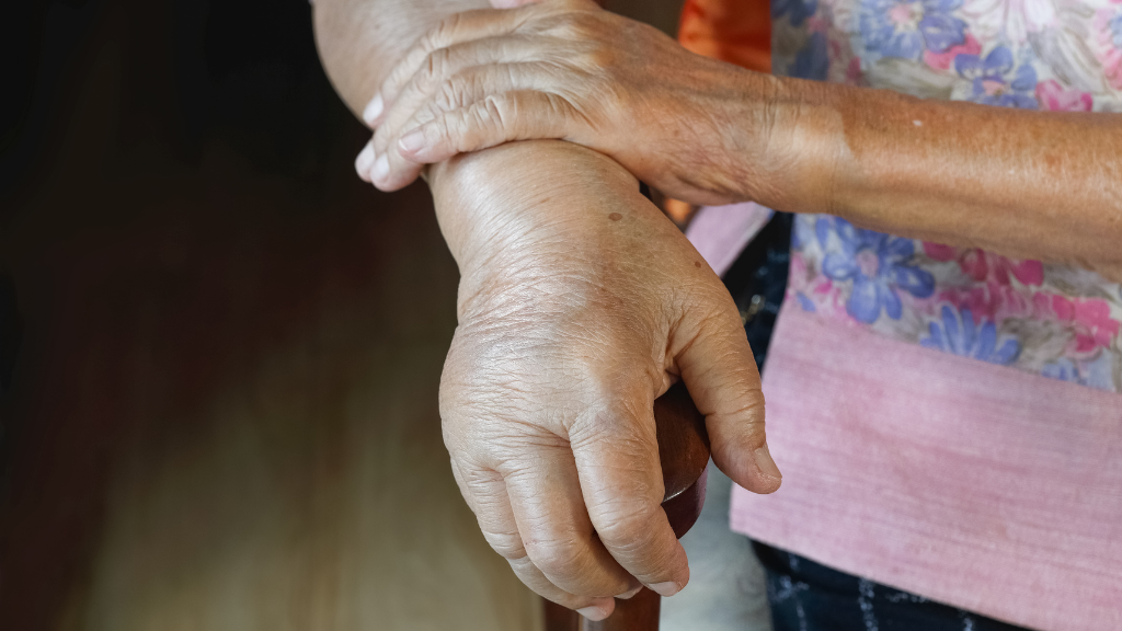Woman holding swollen wrist